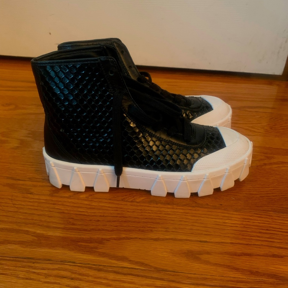 Black and white high top sneakers
